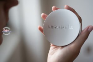 mirabella makeup face powder compact in hand